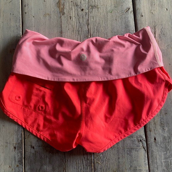 lululemon athletica Pants - Lululemon flip out board short. Pink and white. Size 0 or 2
